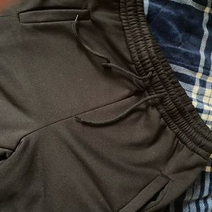 STACKED black sweatpants